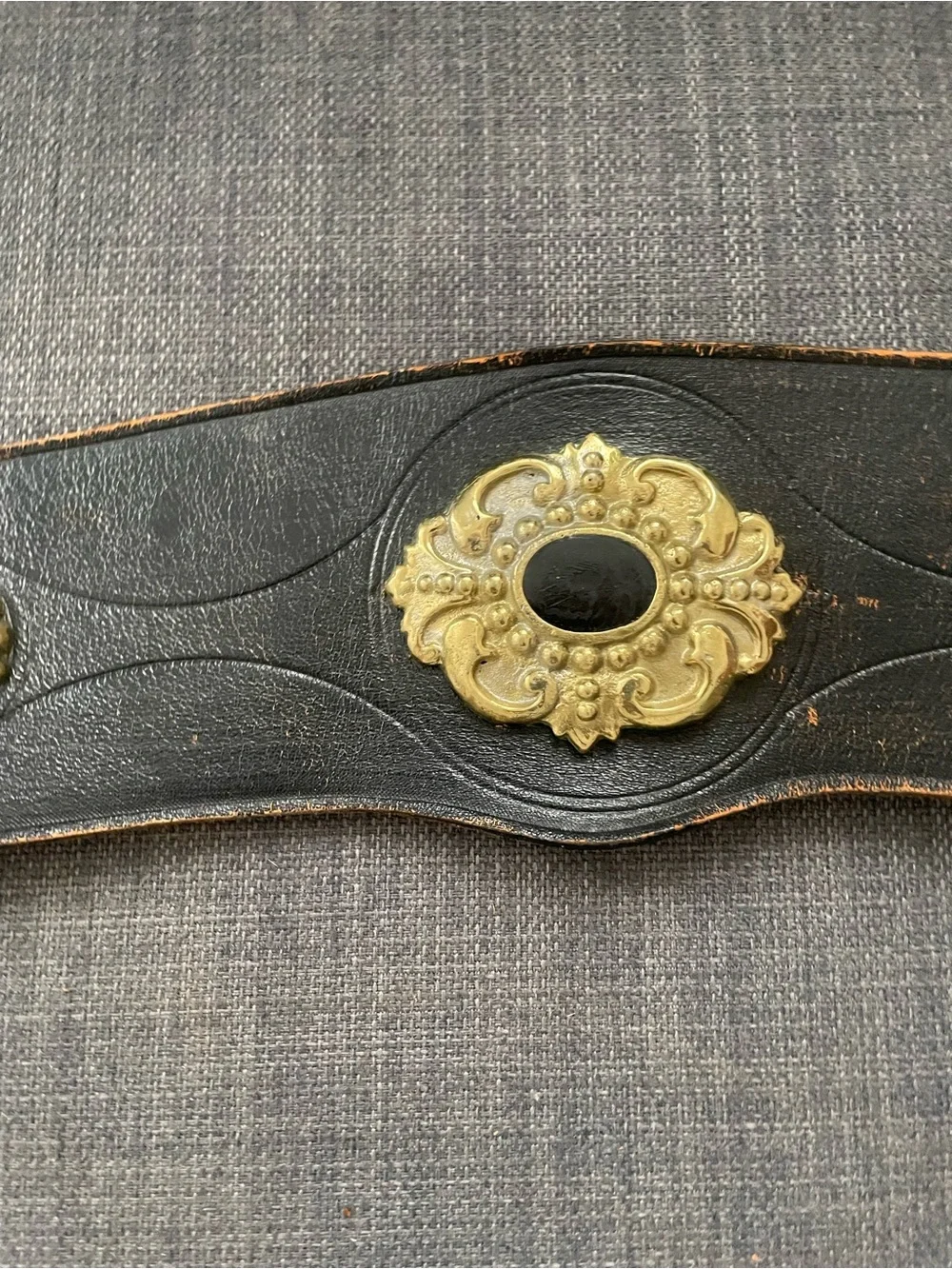Vintage black leather with metal charms